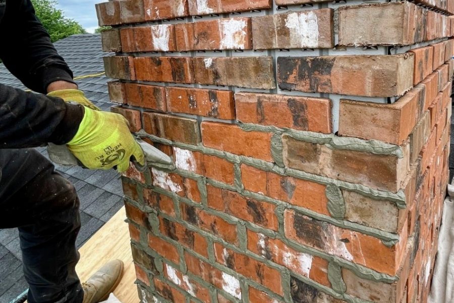 Installing new brick veneer chimney